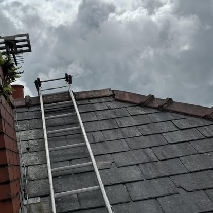 Complete roof replacement project showing new battens and felt installation